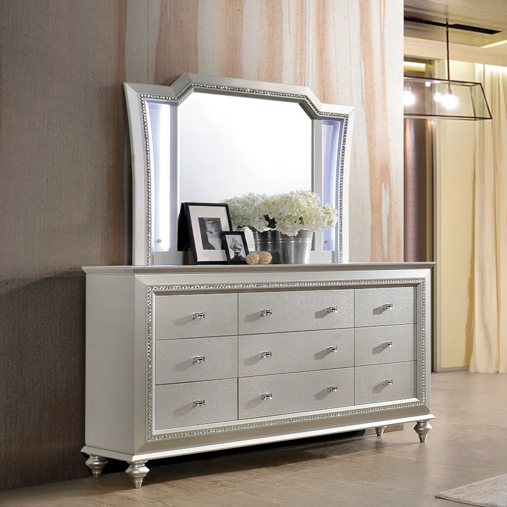 The Kaitlyn dresser provides a commanding presence in any room. Crafted with a transitional look that is an ideal addition to any bedroom, the dresser is accented with textured front and a crystal-like sparkling trim. Its crystal-like trimming creates daz
