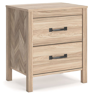 Transform your bedroom into an instant sanctuary. Pairing the look of oak grain with a unique chevron pattern, this nightstand introduces a touch of mid-century modern style that-'s sure to elevate your space. Catering to your busy lifestyle, this nightst