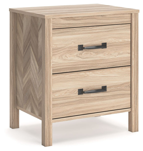 Transform your bedroom into an instant sanctuary. Pairing the look of oak grain with a unique chevron pattern, this nightstand introduces a touch of mid-century modern style that-'s sure to elevate your space. Catering to your busy lifestyle, this nightst
