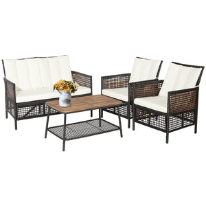 Spend time outdoors with this comfortable 4-piece patio furniture set! Â  Featuring ergonomic armrests  softly padded back and seat cushions  this outdoor conversation set brings extraordinary comfort so that you can use this cozy patio set to entertain y