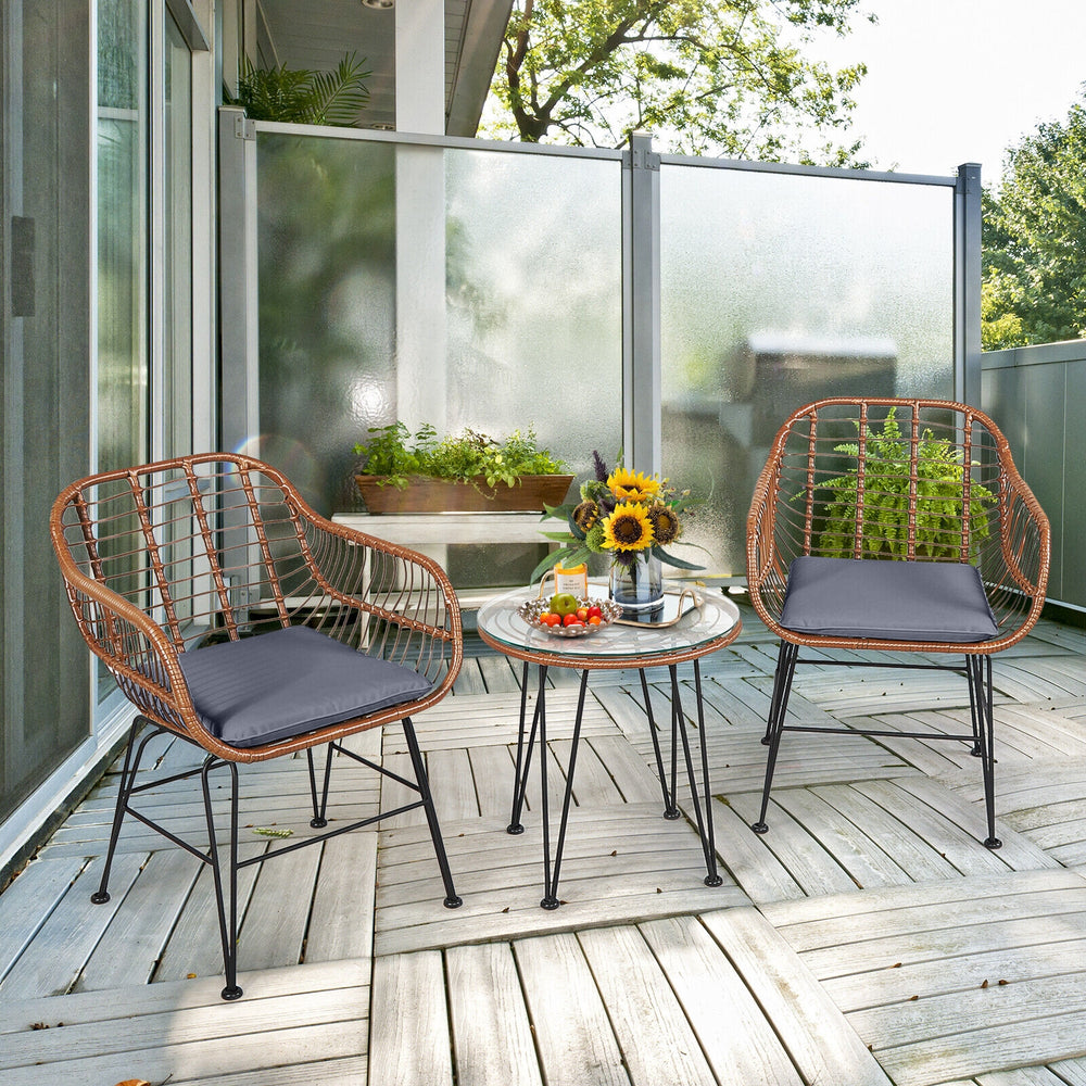 High-quality rattan is durable enough to stand the test of time <br>Including 2 armchairs  1 side table and 2 seat cushions <br>The footpads under the table and chair can prevent scratches <br>The stable construction and iron legs provide strong stability