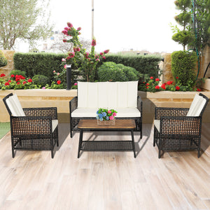Spend time outdoors with this comfortable 4-piece patio furniture set! Â  Featuring ergonomic armrests  softly padded back and seat cushions  this outdoor conversation set brings extraordinary comfort so that you can use this cozy patio set to entertain y