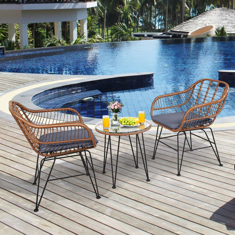 High-quality rattan is durable enough to stand the test of time <br>Including 2 armchairs  1 side table and 2 seat cushions <br>The footpads under the table and chair can prevent scratches <br>The stable construction and iron legs provide strong stability