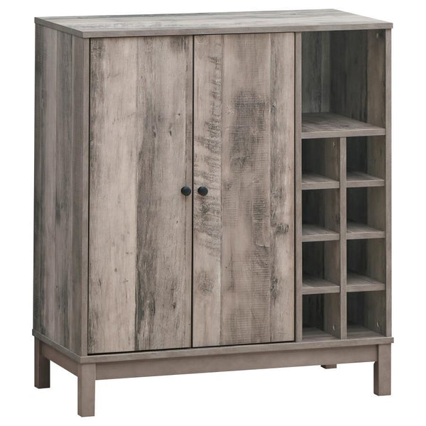 Perfect for compact homes comes this rustic wine cabinet. With a weathered Acacia wood-like finish over the frame, this wine cabinet lends itself to modern farmhouse style living rooms and dining rooms. On the right side are eight wine bottle storage cubb