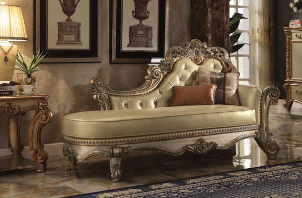 Create an elegant, traditional design in your room with the Vendome Chaise. A hand-crafted piece inspired from the luxurious designs of the past, the beautiful bench features a beige button-tufted back with Nailhead trim, two accent pillows, and elaborate