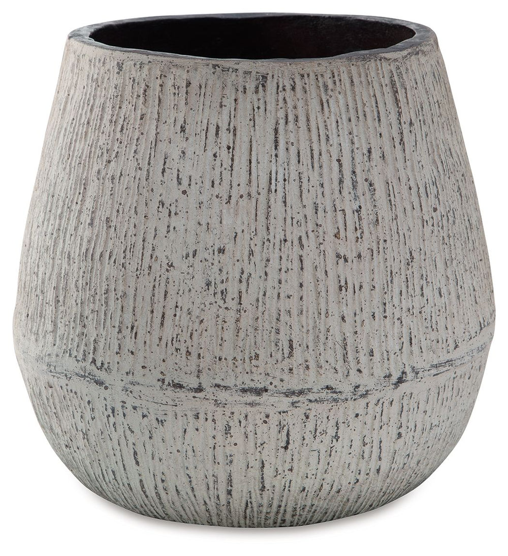 Elevate your home-'s artful appeal with this vase. Its distressed paper composite features a textural aesthetic that gives it mounds of character. Filled with artificial/dried flowers or left unadorned, it-'s a tasteful addition to your creatively curated