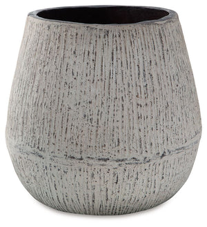 Elevate your home-'s artful appeal with this vase. Its distressed paper composite features a textural aesthetic that gives it mounds of character. Filled with artificial/dried flowers or left unadorned, it-'s a tasteful addition to your creatively curated