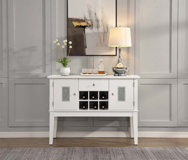 Marvelous and glamorous, the Elizaveta dining table is one to leave guests speechless. Featuring horizontal stripes of embedded faux crystals on the base that glimmer from every angle. The beautiful tabletop is just as impressive, with the same faux diamo