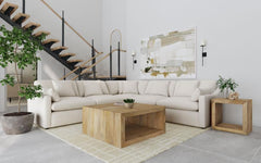 Complete your spacious modern living room with this beautifully designed modular sectional, featuring soft, textural fabric. Feather blend-wrapped box cushion seating with reversible cushions and topstitched details, paired with a thin track arm design, c