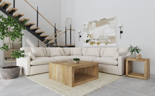 Complete your spacious modern living room with this beautifully designed modular sectional, featuring soft, textural fabric. Feather blend-wrapped box cushion seating with reversible cushions and topstitched details, paired with a thin track arm design, c