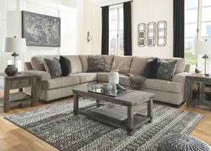  this sectional in a stone-tone neutral upholstery has the corner on style. Merging ultimate comfort with striking good looks