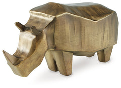 This rhino-shaped sculpture adds a touch of elegant adventure to your decor. Crafted with an antiqued goldtone finish, itâ€™s well-suited for eclectic and contemporary spaces alike. Display it solo as a chic statement, or make it the focal point of a cent