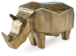 This rhino-shaped sculpture adds a touch of elegant adventure to your decor. Crafted with an antiqued goldtone finish, itâ€™s well-suited for eclectic and contemporary spaces alike. Display it solo as a chic statement, or make it the focal point of a cent