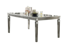 Crafted with past and present in mind, our Kacela dining collection revitalizes and transforms traditional designing ideas. A grand centerpiece, the rectangular table is handsomely finished and enriched by tapered legs and mirror insert top and edges. Pai