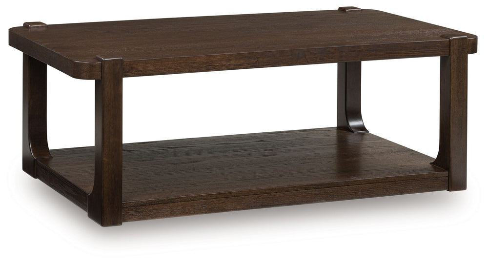 If casual contemporary style is your thing, then you-'ll love this coffee table. Its thick tabletop, softly rounded corners and dark wood-tone finish lend a soothing sensibility. Rearranging your living room layout? The included casters make it easy to mo