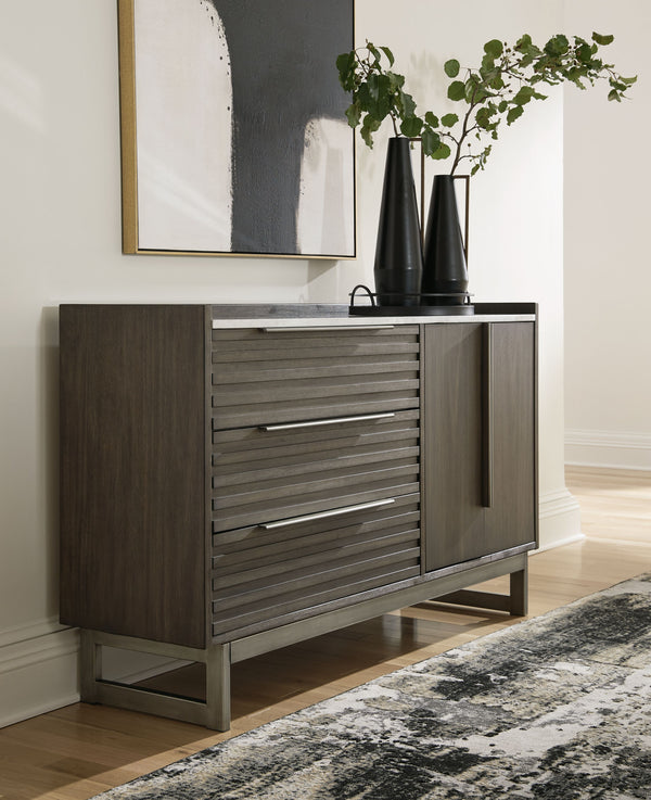  while the streamlined silhouette features overlay slats to create visual interest. A metal base and bar pulls