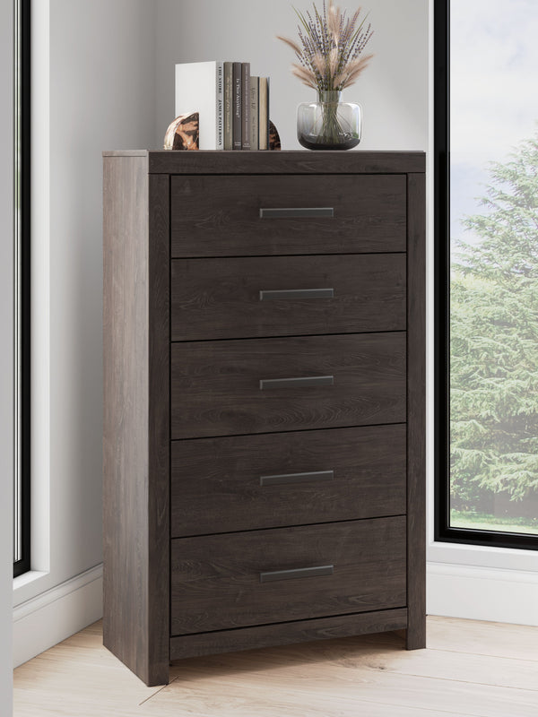  this chest of drawers is a simply chic approach to modern living. A dark charcoal finish blends black and brown undertones