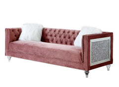 Impressive and bold, the Heiberoll living room collection is sure to impress your guests. The set includes mirrored side trim with faux diamonds to add a glimmering touch. The whimsical acrylic turned legs give off the illusion that the pieces are floatin