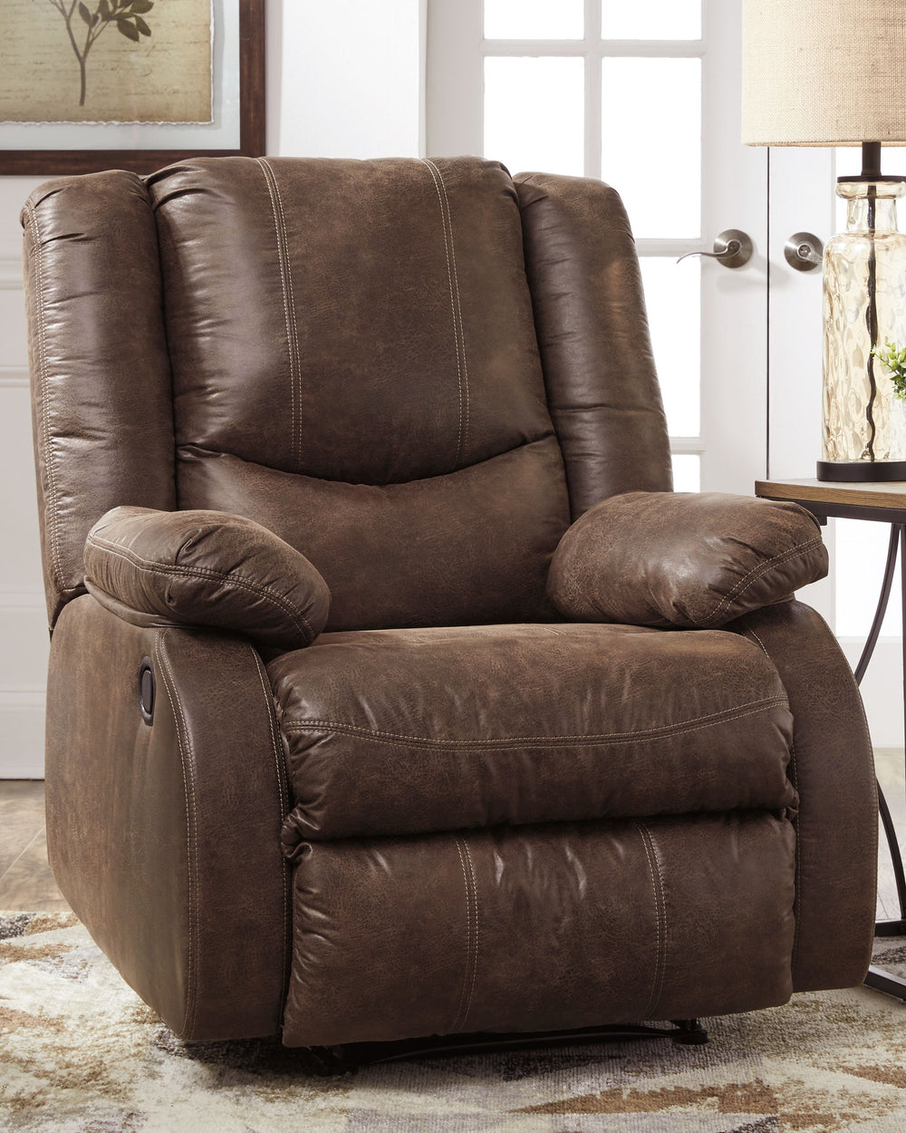 Make a big impression in a smaller footprint with the chic styling of this zero wall recliner. Thanks to its space-conscious design that requires a mere three inches between the wall and chair back, you can stretch out more efficiently. Wrapped in a fabul