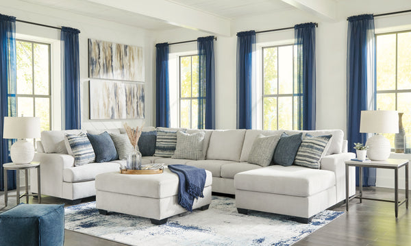 What a pleasant surprise: high-end luxury made comfortably affordable. Thatâ€™s what makes this sectional and ottoman in stone gray so alluring. Made exclusively for those wanting to make a designer statement, this finely crafted sectional is dressed to i