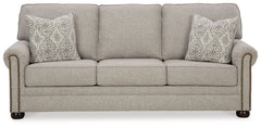 Inspired by the past but rooted firmly in the present, this sofa complements your transitional seating area. Its versatile upholstery is delightfully detailed for a subtle herringbone effect. Designer touches like decorative nailhead trim and bun legs add