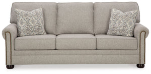 Inspired by the past but rooted firmly in the present, this sofa complements your transitional seating area. Its versatile upholstery is delightfully detailed for a subtle herringbone effect. Designer touches like decorative nailhead trim and bun legs add