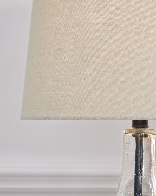  this pair of lamps feature a straight post body enhanced in curvaceous seeded glass. Up top
