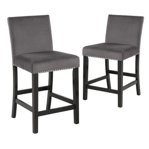 Introducing the New Classic Furniture Celeste Counter Dining Chair â€“ a set of two chairs designed to combine style, comfort, and durability seamlessly. Crafted with solid Rubberwood legs and base stretchers that double as footrests, these counter chairs