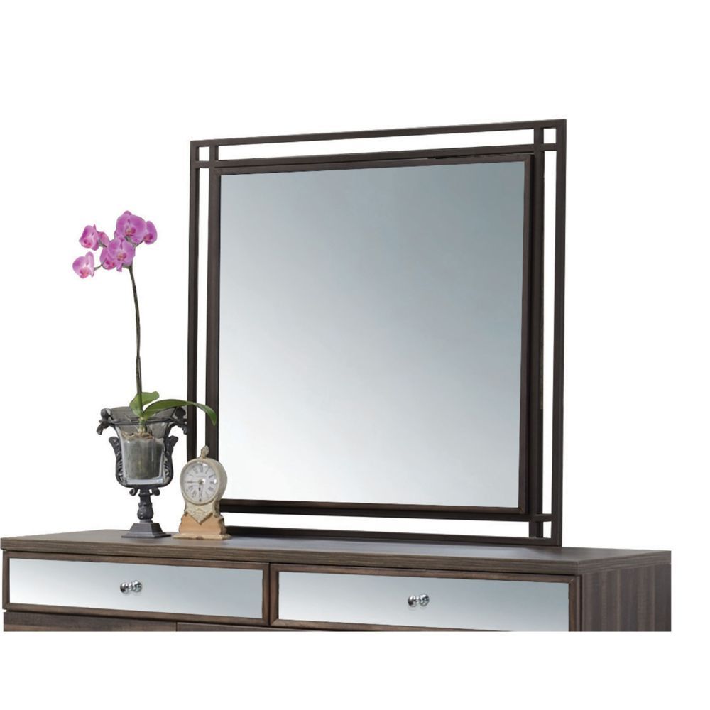 The Adrianna mirror not only gives you a place to check out your reflection, but the beveled surface and walnut finish add an elegant touch to a space. Assembly Required<br/><br/><b>Product Features</b><ul><li>Mirror Not Beveled</li><li>Case: 1Pc/1Ctn</li