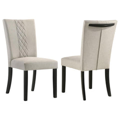 Enhance your dining space with our elegant transitional chairs. These chairs feature a unique cross-hatch design that adds a touch of sophistication to any setting. With beige upholstery and an embellished handle, they strike the perfect balance between p