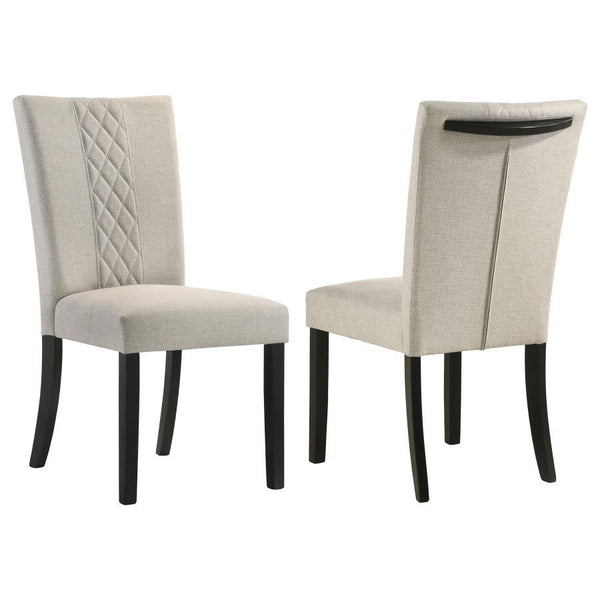 Enhance your dining space with our elegant transitional chairs. These chairs feature a unique cross-hatch design that adds a touch of sophistication to any setting. With beige upholstery and an embellished handle, they strike the perfect balance between p