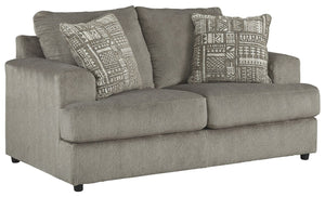 Flaunting a trendsetting silhouette, this loveseat puts the contemporary in your contemporary home. Its â€œthree over twoâ€ profile eliminates the center seat cushion, giving you elongated plushness and deep seating. And the microfiber fabric satisfies y