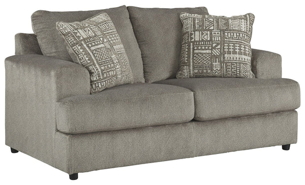 Flaunting a trendsetting silhouette, this loveseat puts the contemporary in your contemporary home. Its â€œthree over twoâ€ profile eliminates the center seat cushion, giving you elongated plushness and deep seating. And the microfiber fabric satisfies y
