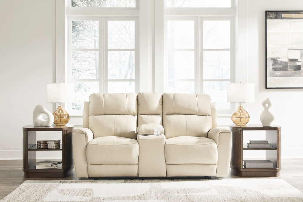 Focus on function. This practical power reclining loveseat with console balances contemporary character and irresistible comfort. Its affordable, expertly matched leather and faux leather upholstery keeps your style up to speed without breaking the bank. 