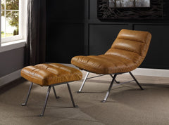 The minimalist design of the Bison lounge set makes it simply timeless. Beautiful top grain leather upholstery takes center stage, accented by horizontal tufting along the entire chair and ottoman. Metal flared legs provide sturdy support without adding v