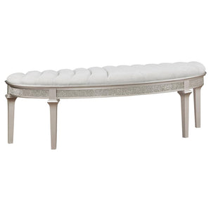 Experience sophistication and functionality with our bench, perfect for both the bedroom and entryway. Inspired by the collection-'s elegance, this bench sports a demilune shape that exudes timeless appeal. The ivory fabric upholstered seat showcases chan