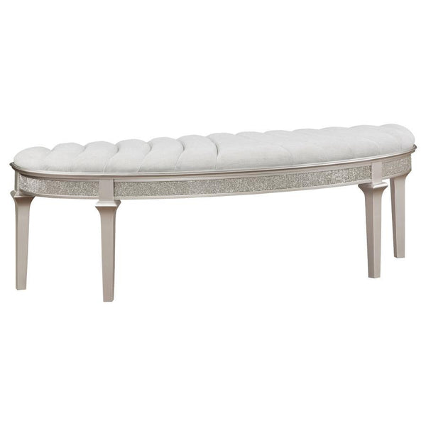 Experience sophistication and functionality with our bench, perfect for both the bedroom and entryway. Inspired by the collection-'s elegance, this bench sports a demilune shape that exudes timeless appeal. The ivory fabric upholstered seat showcases chan
