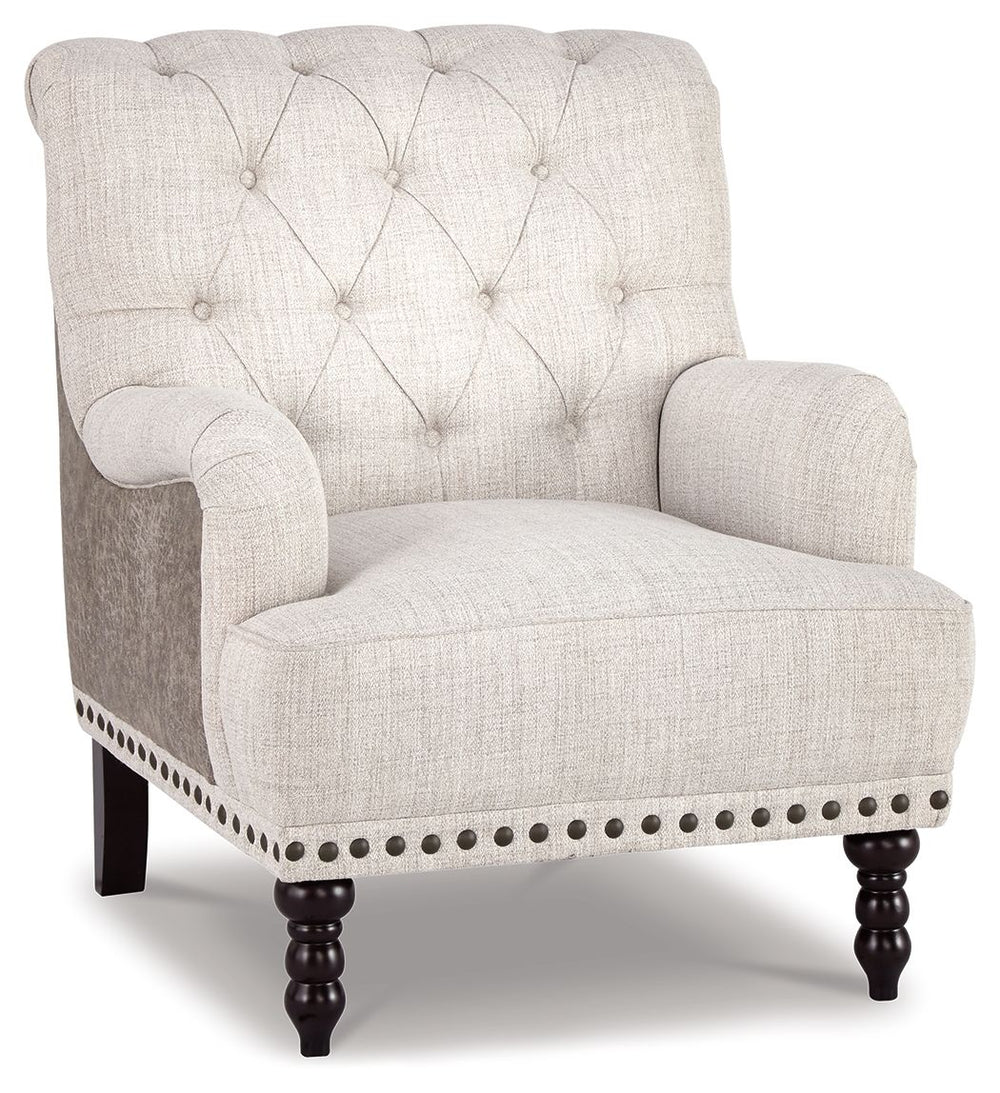 Fresh and sophisticated. This accent chair with button tufting is a classy addition to your home. Inside-out design with linen weave fabric on the seating area and taupe faux leather on the back. Large nailhead trim ties the look together. Charles of Lond