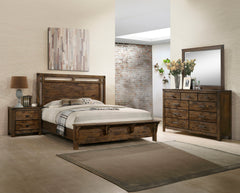 Immerse yourself in the rustic charm of this inviting bedroom collection that captures the essence of a serene retreat. The robust bed, with its sturdy frame and rich, weathered wood finish, conjures the warm allure of a mountain lodge. Complementing the 