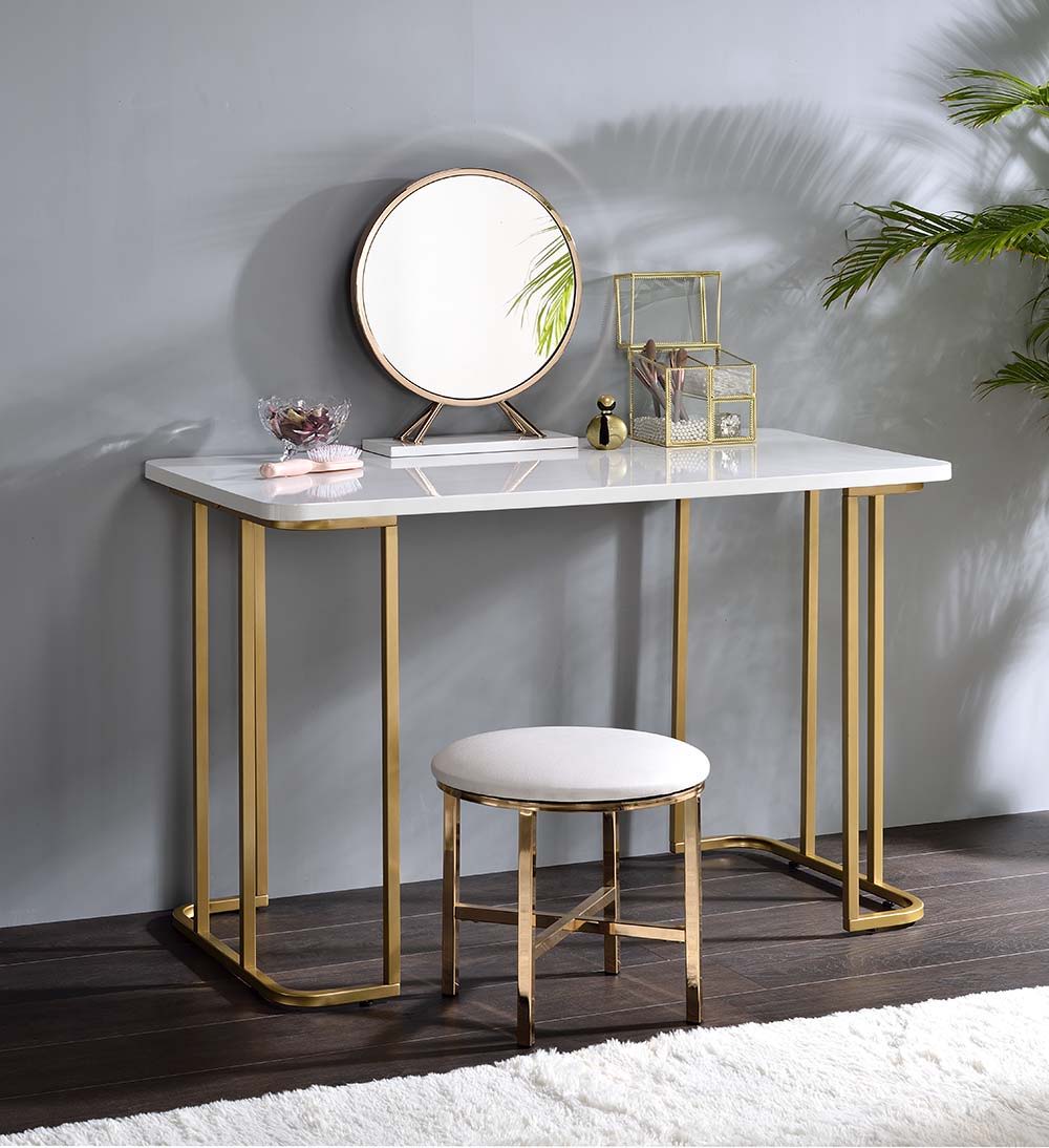 Personify your workplace with some bold, clear and strong accessories. The Estie Writing Desk boasts a clean-lined metal sled base, with gold finish enhancing its modern silhouette. White rectangle table top offers a spacious and clean workplace. Simple a