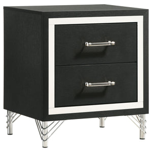 Gleaming chrome trim captures attention on a modern two-drawer nightstand. Perfect for your sophisticated bedside, it boasts a bold black finish case that offers the perfect touch of depth with its chrome trim. A pair of long bar pulls decorate drawer fro