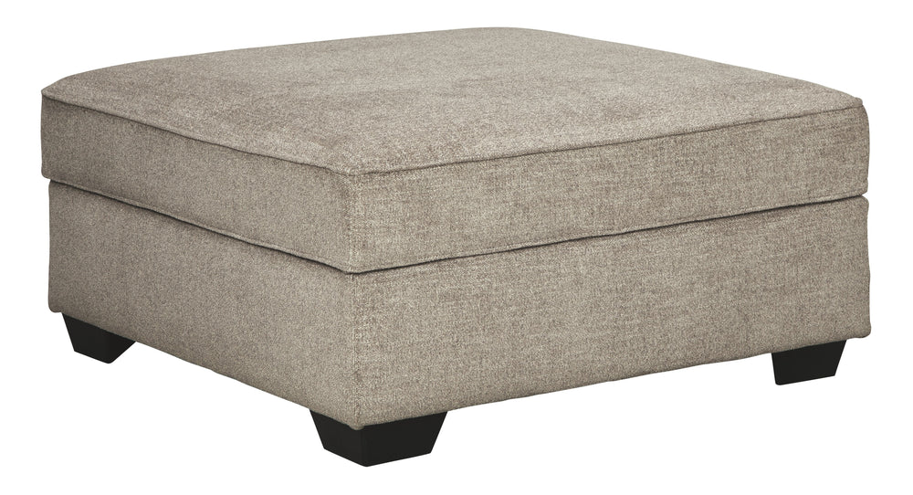 Whether your style is clean and contemporary or cozy modern farmhouse, this generously sized ottoman in a stone-tone neutral upholstery has the corner on style. Merging ultimate comfort with striking good looks, this alluring ottoman makes itself useful w