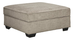 Whether your style is clean and contemporary or cozy modern farmhouse, this generously sized ottoman in a stone-tone neutral upholstery has the corner on style. Merging ultimate comfort with striking good looks, this alluring ottoman makes itself useful w