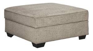 Whether your style is clean and contemporary or cozy modern farmhouse, this generously sized ottoman in a stone-tone neutral upholstery has the corner on style. Merging ultimate comfort with striking good looks, this alluring ottoman makes itself useful w