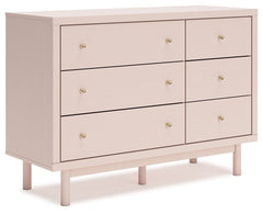 Pretty in pink. This dresser keeps the spirit of your homeâ€™s modern aesthetic while suiting all your young oneâ€™s needs. Its subtle blush finish brings a playful, charming vibe to organizing clothes and other essentials. Made for her and styled for you