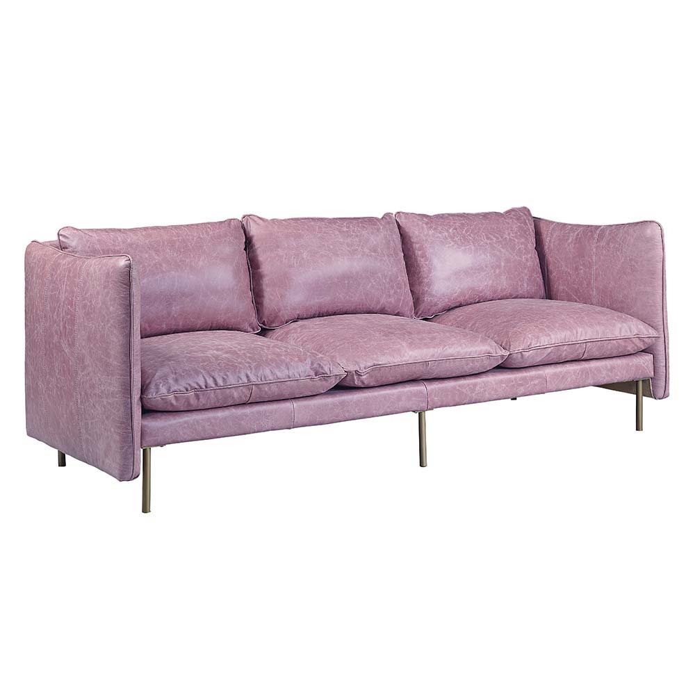 The Metis sofa is upholstered in buttery SOFT top grain leather in a Wisteria color that adds a touch of effortless romance to any room. The luxurious sofa is equipped with ultra-plush cushions and backrests. The metal brass legs add a hint of modern indu