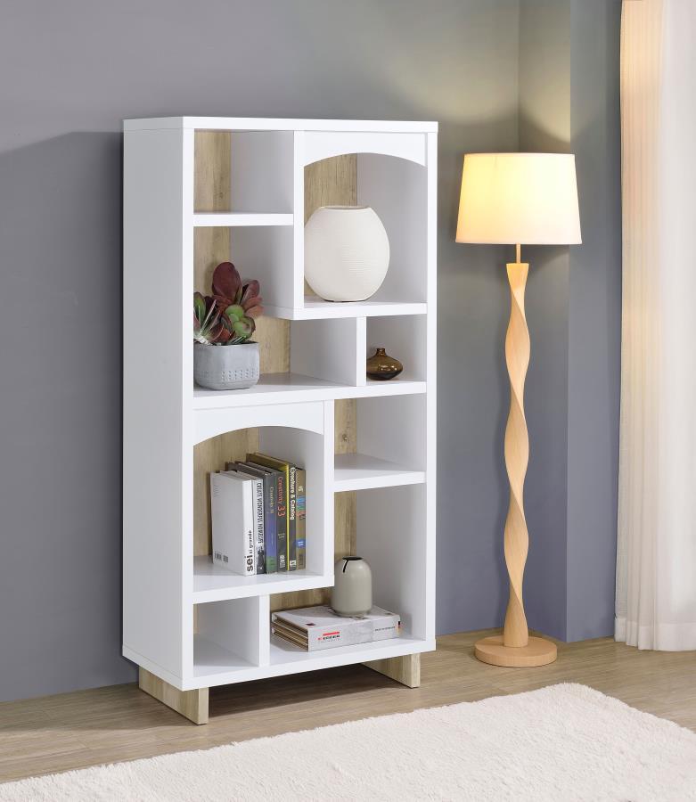 Indulge in the cozy, charming nature of a decorative bookcase. It-'s an asymmetric design with eight compartments over six shelves, offering easy spaces for decor, books, and other personal treasures. The bookcase shows off a two-tone finish combination, 