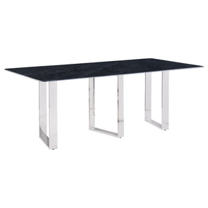 Inject a sense of sophistication with a modern rectangular dining table. Featuring a sintered stone tabletop with a gray marble finish and slim, sleek silhouette, the table becomes a stylish centerpiece in your dining room. It stands on three open frame l