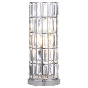 A sleek silhouette brings elegance and regality to a modern three-light table lamp. Adorned with a curtain of sparkling rectangular crystals, it offers glam elegance on a console or side table. Tucked within its column silhouette is space for three energy