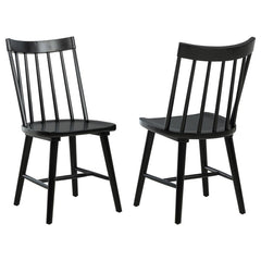 This modern Windsor-style dining side chair refreshes a classic silhouette with a trendy finish, creating a sleek, contemporary accent in any dining room. Built from solid hardwood, it ensures sturdy support and everyday durability. Its slender spindles a